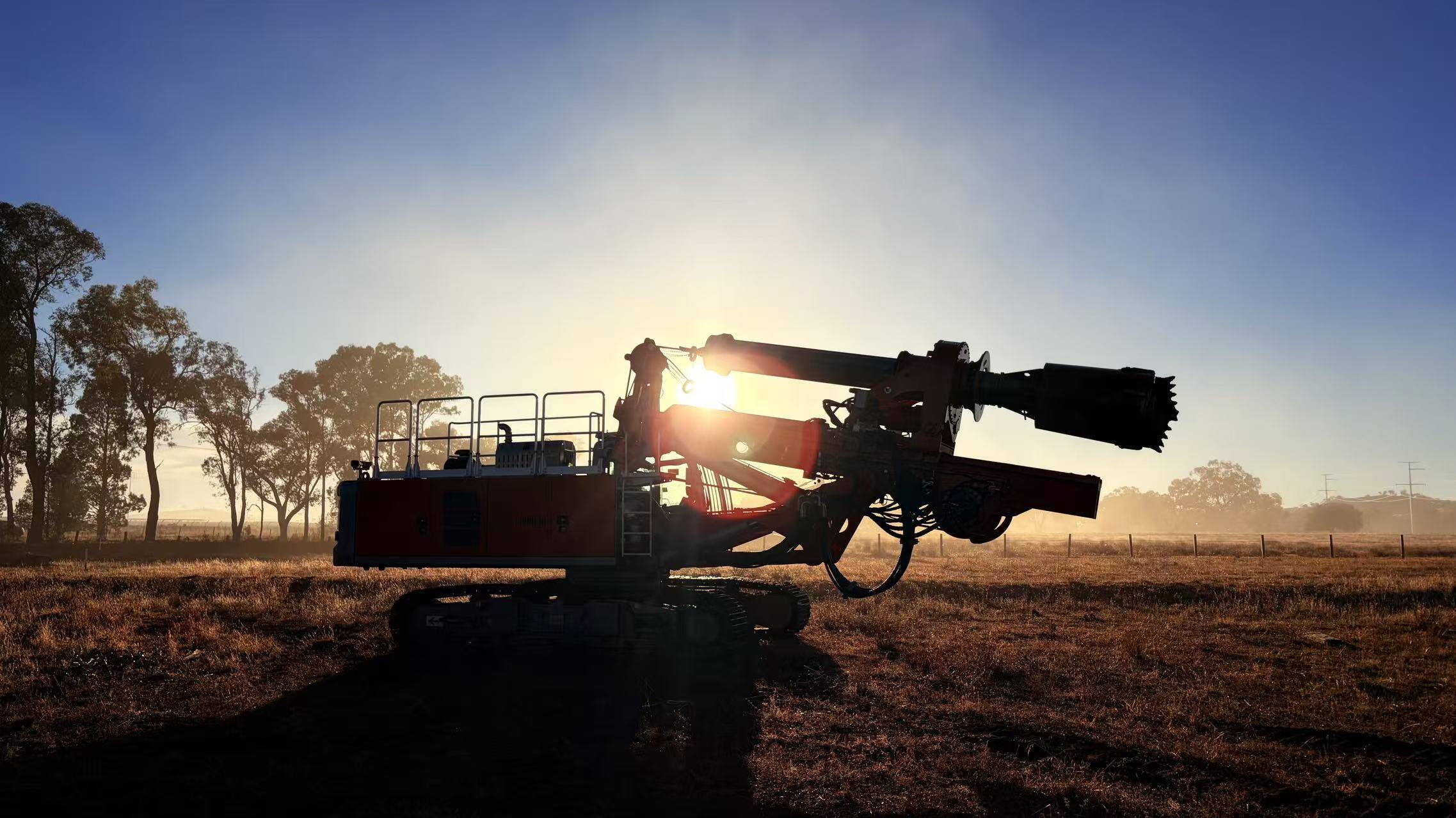 Specialist deep foundation rig at sunrise